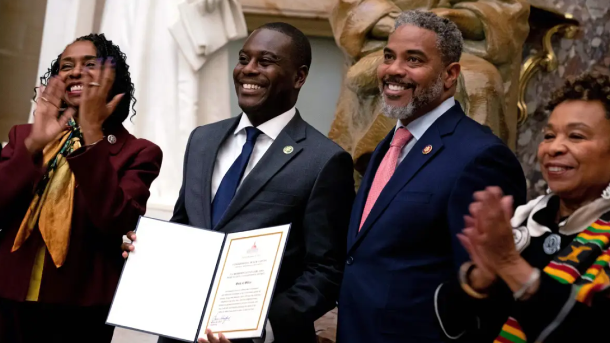 US Representative Gabe Amo (D-RI) (C), the first Black representative from Rhode Island, is sworn in as the 60th member of the Congressional Black Caucus in Statuary Hall at the US Capitol in Washington, DC, on November 14, 2023. Amo is replacing former US Representative David Cicilline, who resigned from Congress to become president and CEO of the Rhode Island Foundation. (Photo by Stefani Reynolds / AFP) (Photo by STEFANI REYNOLDS/AFP via Getty Images)