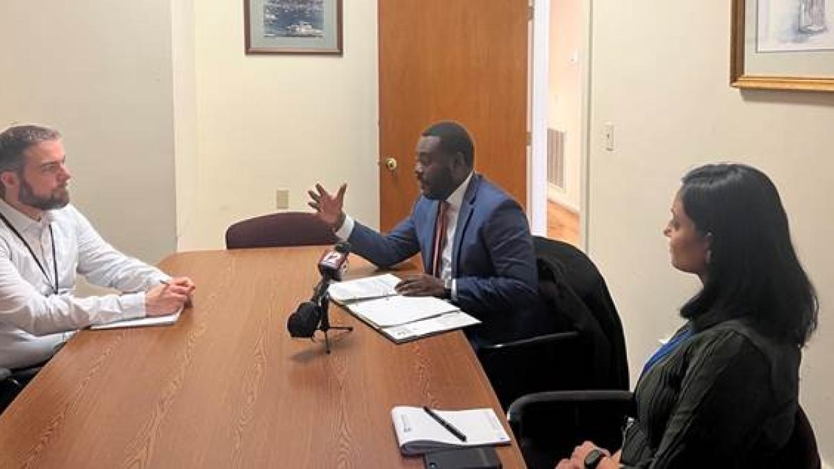Congressman Amo speaks with Jesse Shipley and Dr. Jasma Patel of East Bay Community Action Program while touring East Bay Dental Center