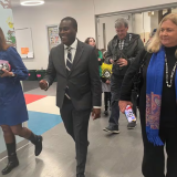 Newly elected US Representative Gabe Amo, a Rhode Island Democrat, tours the Pleasant View Elementary School in Smithfield with Principal Terry Viera, left, and Smithfield public schools Superintendent Dawn Bartz, right.