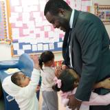 Congressman Amo greets students at Children’s Friend in Providence during his visit